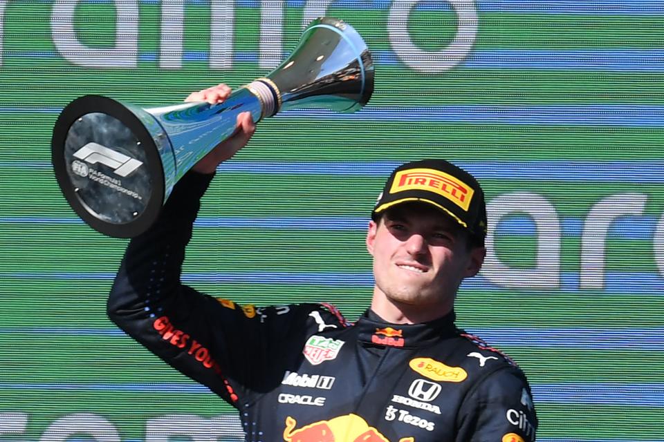 Pictured here, Red Bull's Dutch driver Max Verstappen celebrates on the podium after winning the US GP.