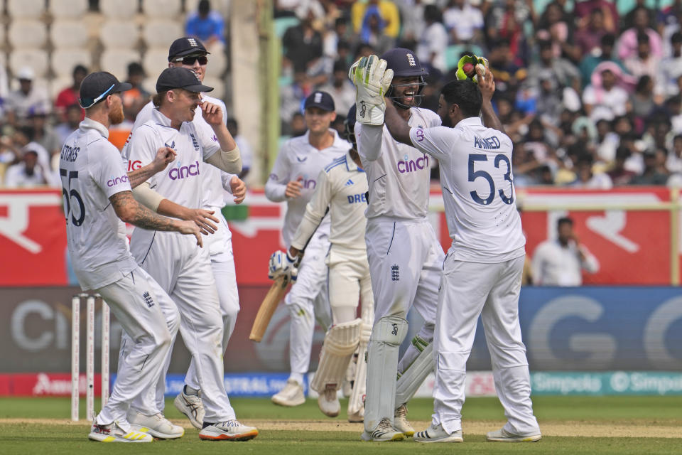 England's wicketkeeper Ben Foakes and Rehan Ahmed, right, celebrate the wicket of India's Rajat Patidar on the third day of the second cricket test match between India and England in Visakhapatnam, India, Sunday, Feb. 4, 2024. (AP Photo/Manish Swarup)