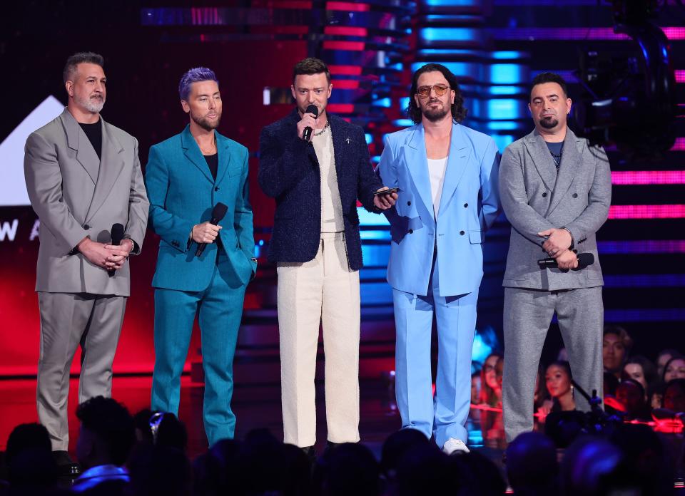 Joey Fatone (left), Lance Bass, Justin Timberlake, JC Chasez and Chris Kirkpatrick of NSYNC reunite at the 2023 MTV Video Music Awards on Sept. 12, 2023.