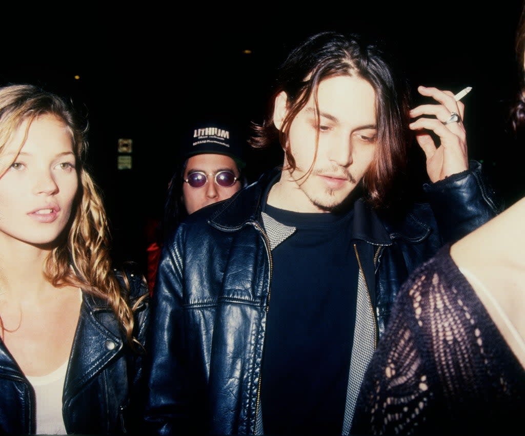 Kate Moss with Johnny Depp in February 1994  (Barry King/Alamy/PA)