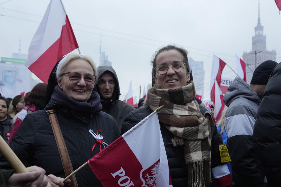 People take part in a yearly march on Poland's Independence Day holiday in Warsaw, Poland, on Saturday, Nov. 11, 2023. The Independence Day holiday celebrates the restoration of Poland's national sovereignty in 1918, at the end of World War I and after 123 years of foreign rule. (AP Photo/Czarek Sokolowski)