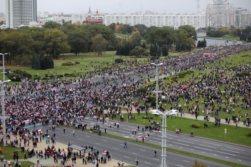 Belarusian opposition supporters hold a rally in Minsk