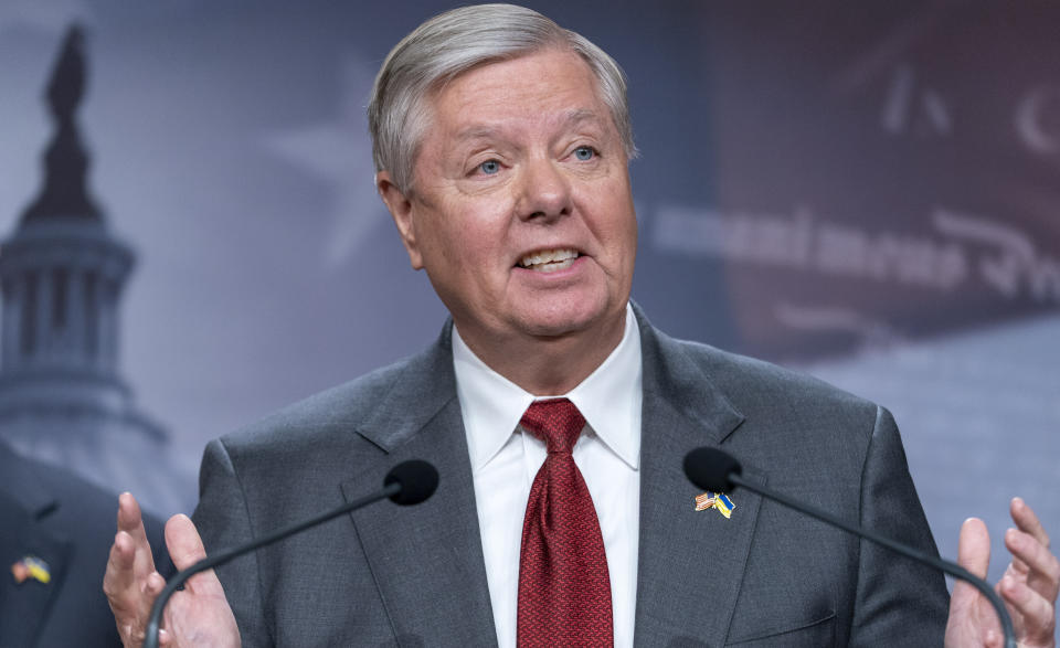 Sen. Lindsey Graham at the microphone.