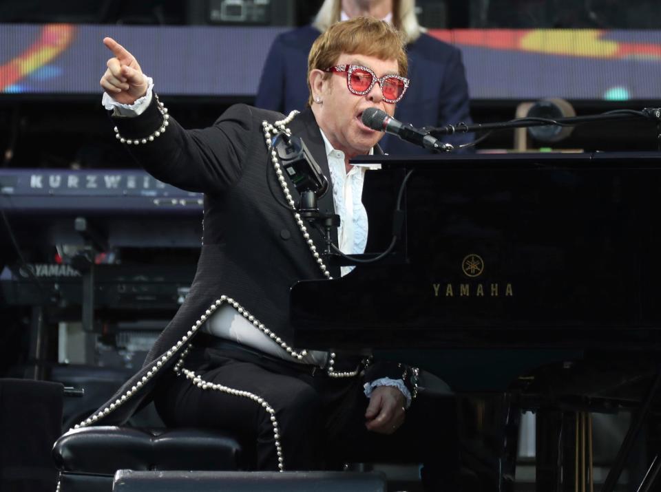 Elton John plays for fans during his farewell tour at Comerica Park Monday, July 18, 2022. 