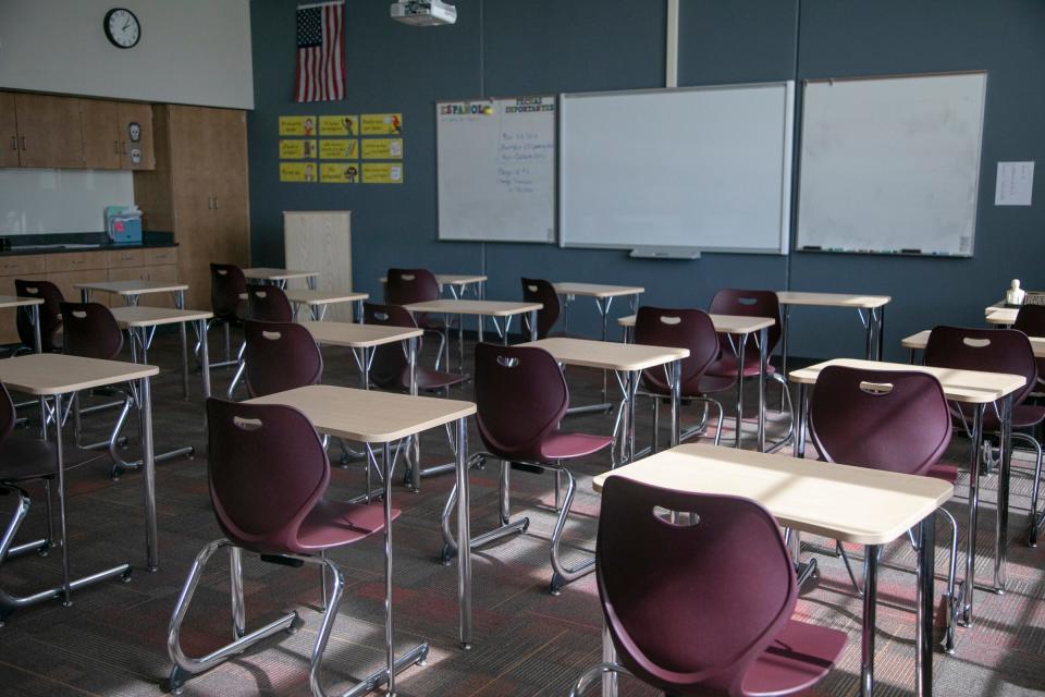 Desks sit empty in Detroit after schools were ordered shut on March, 13, 2020.