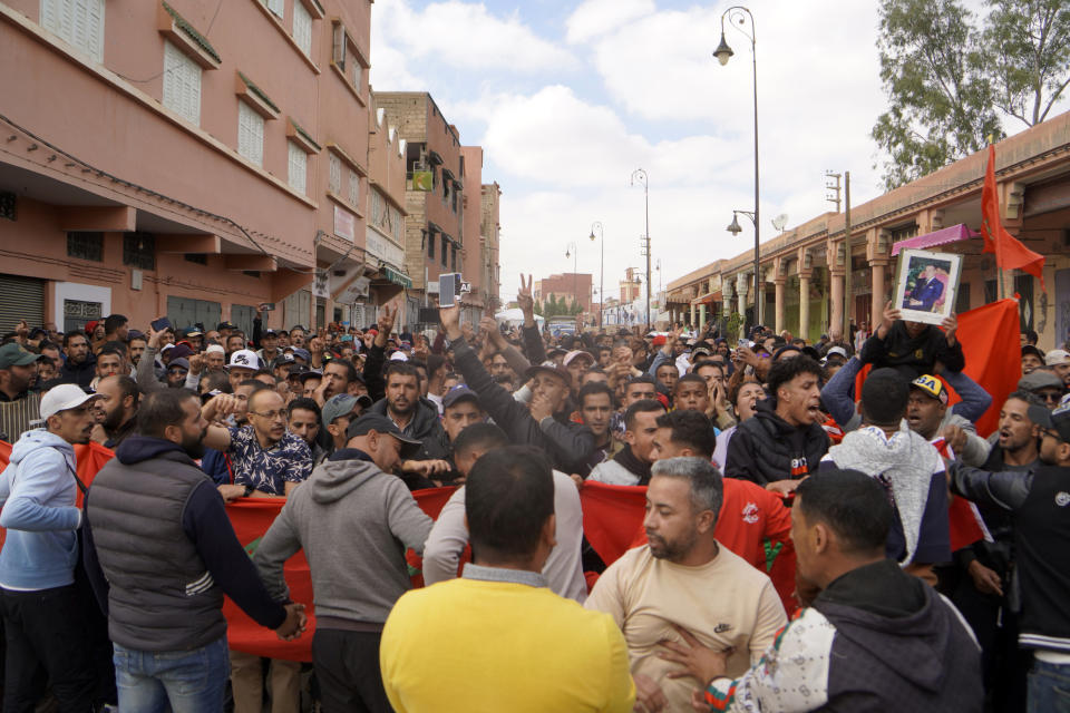 People displaced by the earthquake protest against lack of emergency assistance and worsening housing condition, in Amizmiz, outside Marrakech, Morocco, Tuesday, Oct. 24, 2023. (AP Photo/Youssef Mazouz)