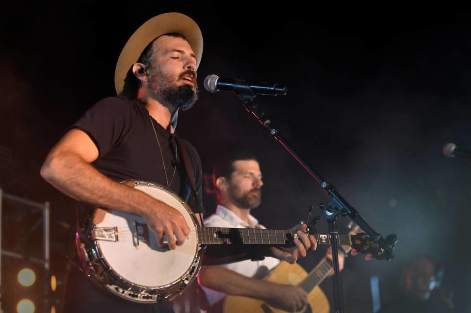 From left, Scott Avett and his brother Seth, seen here at a 2021 concert in Baltimore. The Avett Brothers remain actively involved in the evolution of “Swept Away” as it prepares to make its East Coast debut in November at Arena Stage in Washington, D.C.