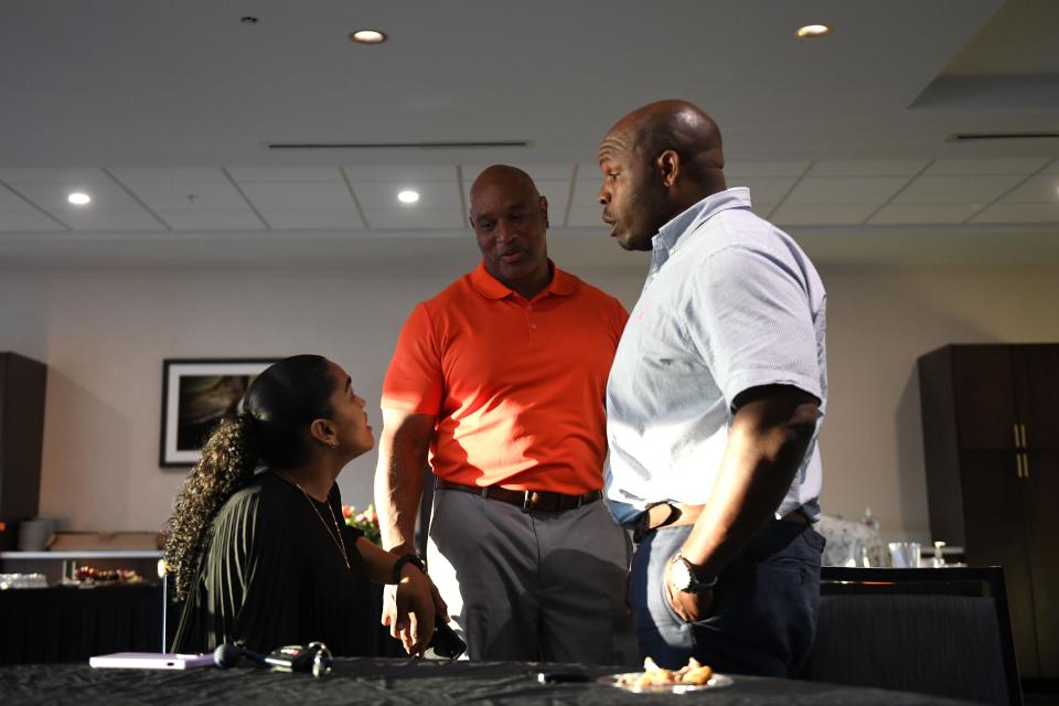 FILE - Richmond County Sheriff candidate Eugene "Gino Rock" Brantley (center) talks with supporters at his watch party at Hyatt House on Tuesday, May 21, 2024.