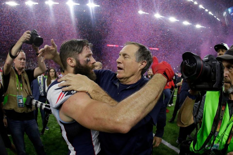 New England Patriots coach Bill Belichick, right, congratulates Julian Edelman after defeating the Atlanta Falcons in overtime at Super Bowl LI on Sunday, Feb. 5, 2017, in Houston.