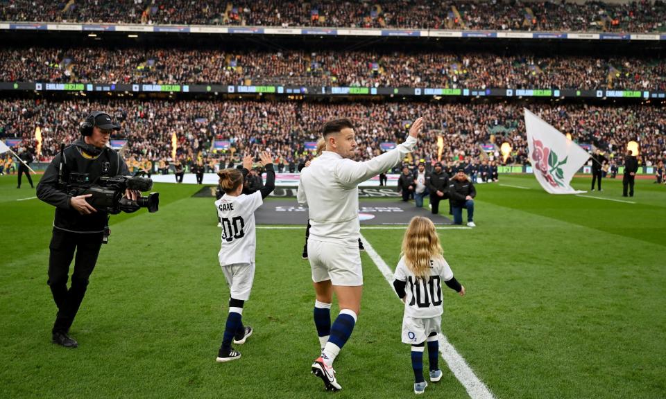 <span>Twickenham salutes Danny Care, who made his 100th appearance for <a class="link " href="https://sports.yahoo.com/soccer/teams/england-women/" data-i13n="sec:content-canvas;subsec:anchor_text;elm:context_link" data-ylk="slk:England;sec:content-canvas;subsec:anchor_text;elm:context_link;itc:0">England</a> against Ireland.</span><span>Photograph: Dan Mullan/RFU/The RFU Collection/Getty Images</span>