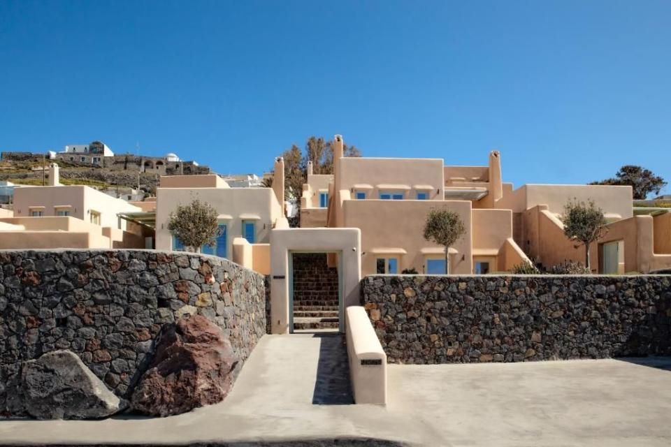 <p>In a break from the island’s whitewashed tradition, <a href="https://www.booking.com/hotel/gr/voreina-gallery-suites.en-gb.html?aid=2200764&label=best-hotels-santorini" rel="nofollow noopener" target="_blank" data-ylk="slk:Voreina Gallery Suites;elm:context_link;itc:0;sec:content-canvas" class="link ">Voreina Gallery Suites</a> are more of a dusky peach than the regular bright white. More colour comes to the interiors courtesy of the eye-catching artworks – the hotel was created as an 'inhabitable gallery'. </p><p>It’s in the village of Pyrgos, with a view across the island and out to the Aegean. The nine suites have kitchens, private pools or Jacuzzis and fireplaces that don’t see much action for most of the year; and some are big enough to sleep five guests, making them – and the on-site villas – perfect for group getaways.</p><p><a class="link " href="https://www.booking.com/hotel/gr/voreina-gallery-suites.en-gb.html?aid=2200764&label=best-hotels-santorini" rel="nofollow noopener" target="_blank" data-ylk="slk:CHECK AVAILABILITY;elm:context_link;itc:0;sec:content-canvas">CHECK AVAILABILITY</a></p>