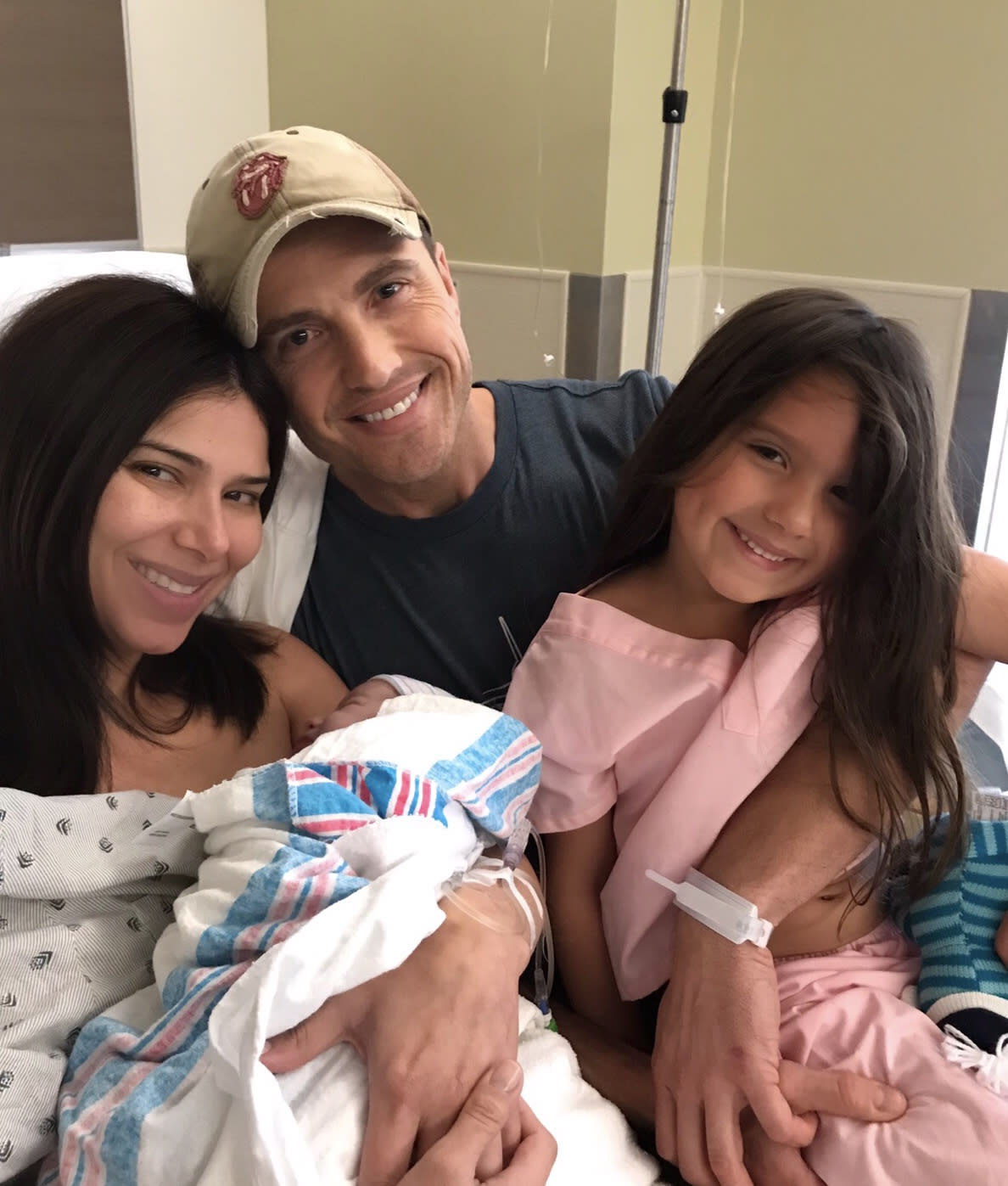 Roselyn Sanchez and Eric Winter with son and daughter