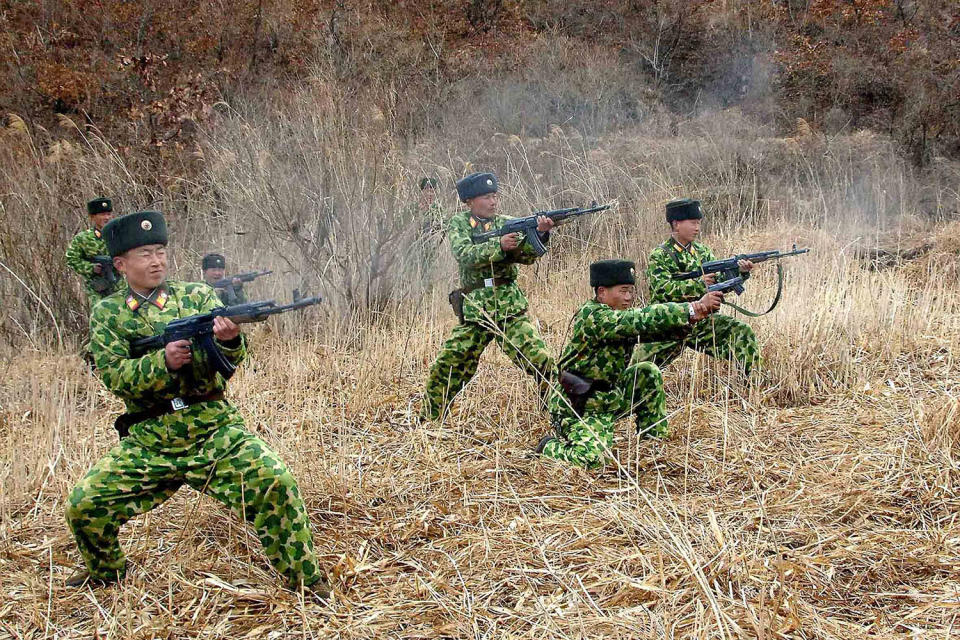 North Korean soldiers firing weapons