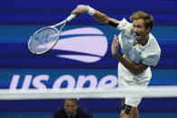 FILE - In this Sept. 6, 2019, file photo, Daniil Medvedev, of Russia, serves to Grigor Dimitrov, of Bulgaria, during the men's singles semifinals of the U.S. Open tennis championships in New York. The U.S. Tennis Association intends to hold the U.S. Open Grand Slam tournament in New York starting in August without spectators, if it gets governmental support -- and a formal announcement could come this week.(AP Photo/Eduardo Munoz Alvarez, File)