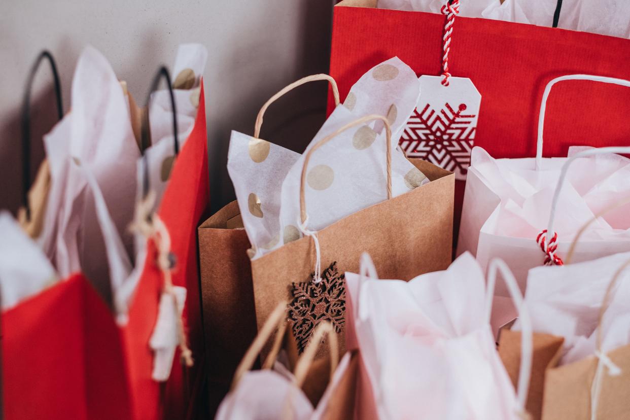 Spending on Christmas gifts is predicted to go down, while spending on decorations will likely increase, report says. (freestocks/Unsplash)