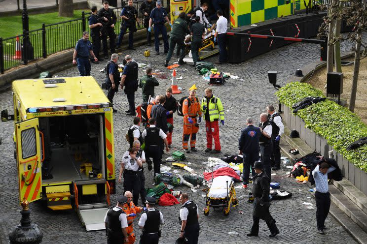 Emergency services at the scene outside the Palace of Westminster (Stefan Rousseau/PA via AP).