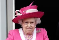 <p>The Queen looks frustrated after her horse (who had been favored to win) places third in the Epsom Derby at Epson Downs. <br></p>