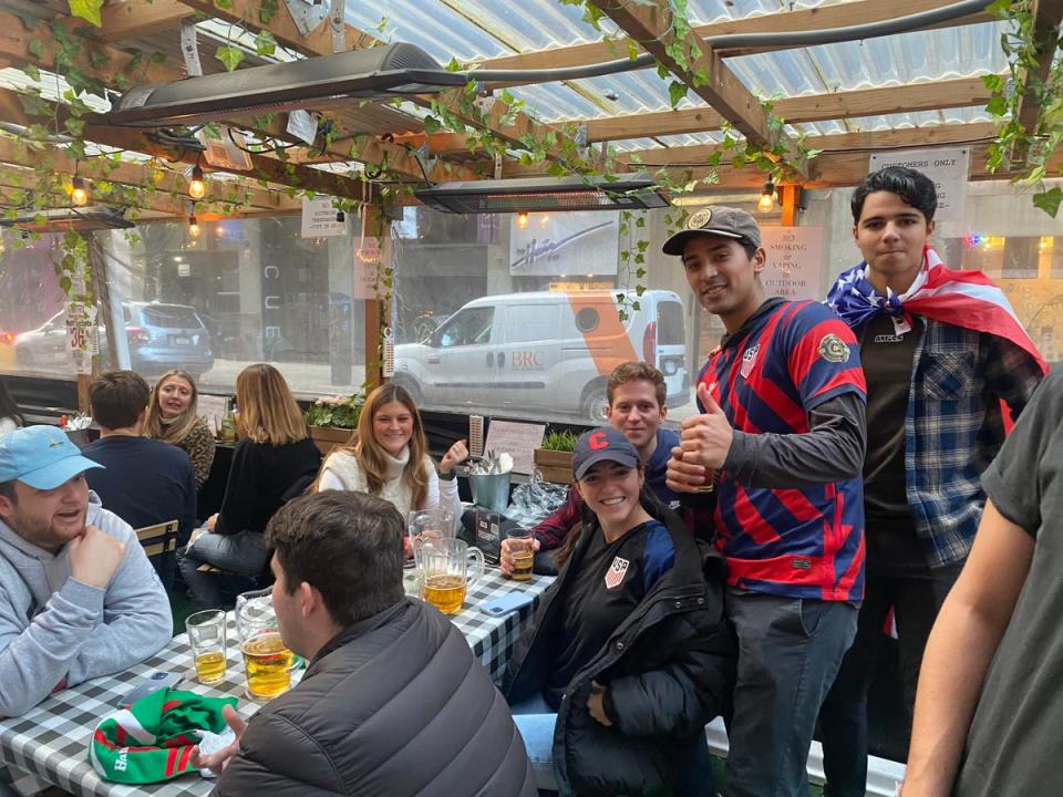 Aaron Angeles, a 22-year-old New Yorker and lifelong soccer fan, takes in the England v USA game at a NYC bar. (Richard Hall / The Independent)