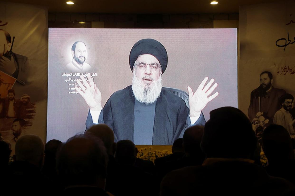 Lebanon's Hezbollah leader Sayyed Hassan Nasrallah gives a televised address at a memorial ceremony to mark one week since the passing of Mohammad Yaghi, one of the powerful armed group's figures, in Baalbek, Lebanon, on Friday. (Mohamed Azakir/Reuters - image credit)