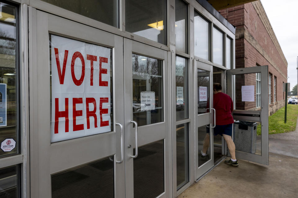 A voter enters Tuscaloosa County's Ward 44 Belk Activity Center during a primary election, Tuesday, March 5, 2024, in Tuscaloosa, Ala. Fifteen states and a U.S. territory hold their 2024 nominating contests on Super Tuesday this year. (AP Photo/Vasha Hunt)