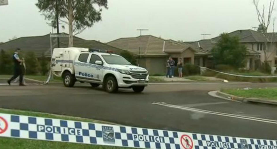 A woman's body was found in a Minto garage on Easter Sunday.