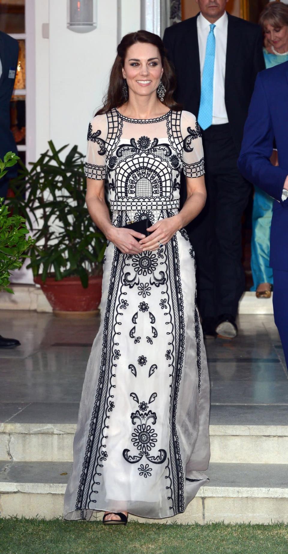 <p>At an official garden party reception celebrating the Queen’s 90th birthday in New Delhi, the Duchess donned a stunning monochrome Alice Temperley crop top and skirt co-ord, boasting traditional Indian embroidery. The ensemble doesn’t come cheap: The top costs £1,995, while the skirt has a price tag of £1,995. <i>[Photo: PA Images]</i><br></p>