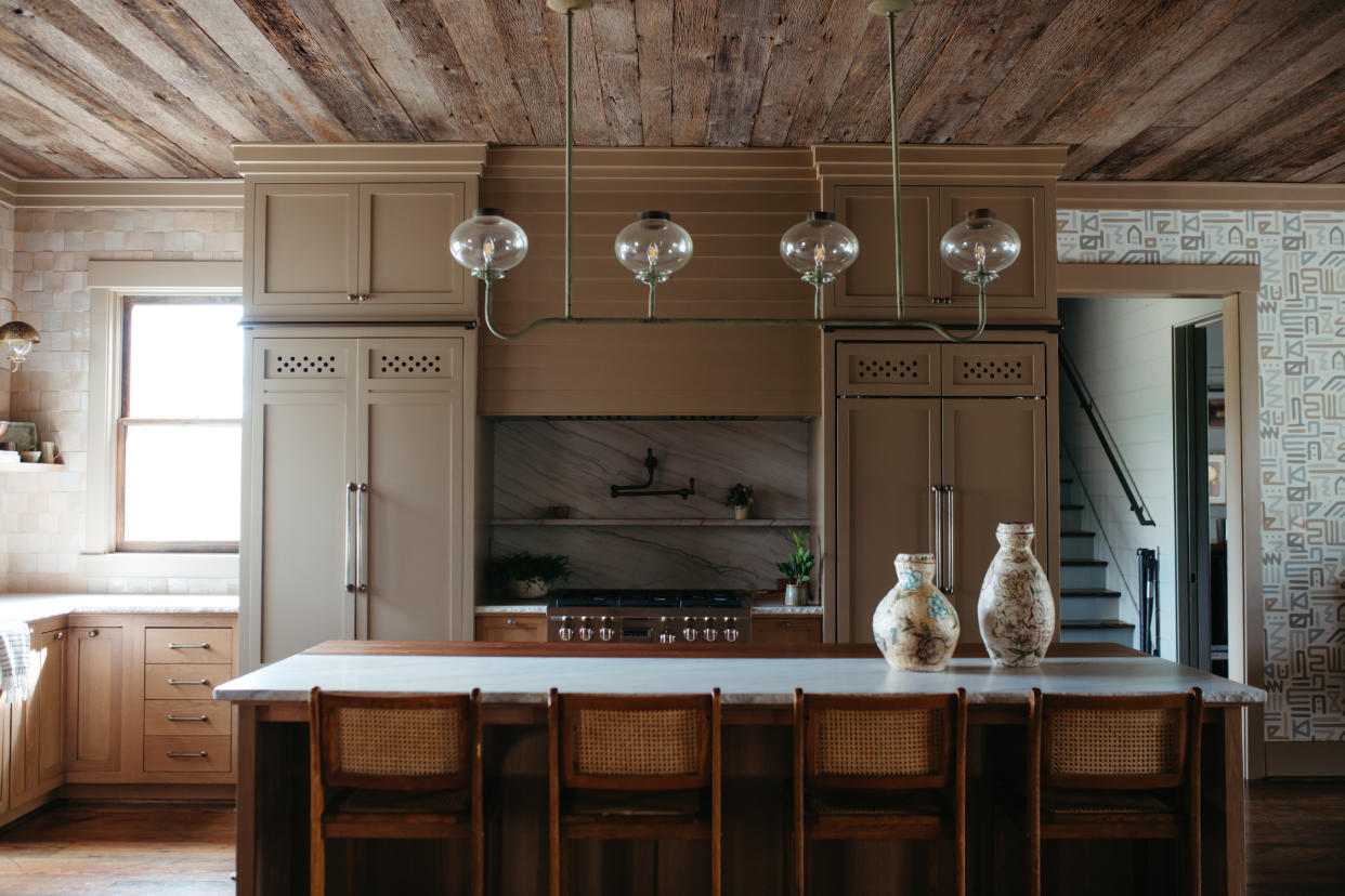  A dark brown kitchen . 