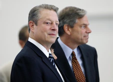 Former U.S. Vice-President Al Gore (L), who is also the co-founder of Current TV, stands next to Joel Hyatt, the other co-founder of Current TV, in Burbank, California August 5, 2009. REUTERS/Mario Anzuoni