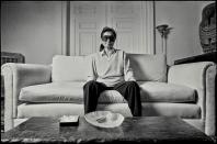 <p>Since 1973, multimedia artist Yoko Ono has resided in New York's iconic Dakota building on Central Park West. Here, she's pictured in the apartment in 1980, one year to the day after the murder of her husband, John Lennon.</p>