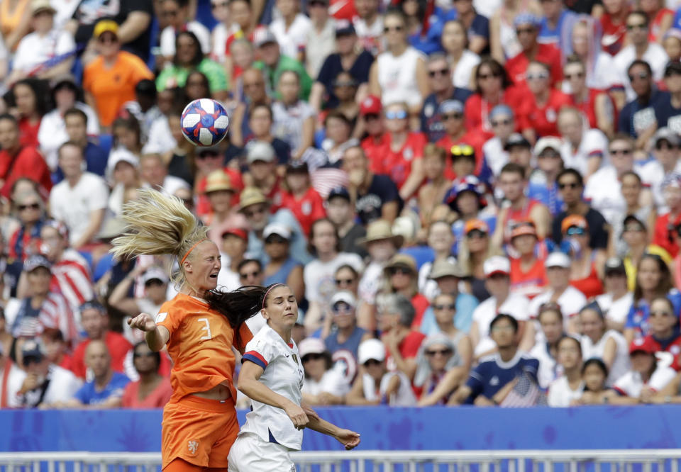 United States' Alex Morgan, right, challenges Netherlands' Stefanie Van Der Gragt, left, during the Women's World Cup final soccer match between US and The Netherlands at the Stade de Lyon in Decines, outside Lyon, France, Sunday, July 7, 2019. (AP Photo/Alessandra Tarantino)