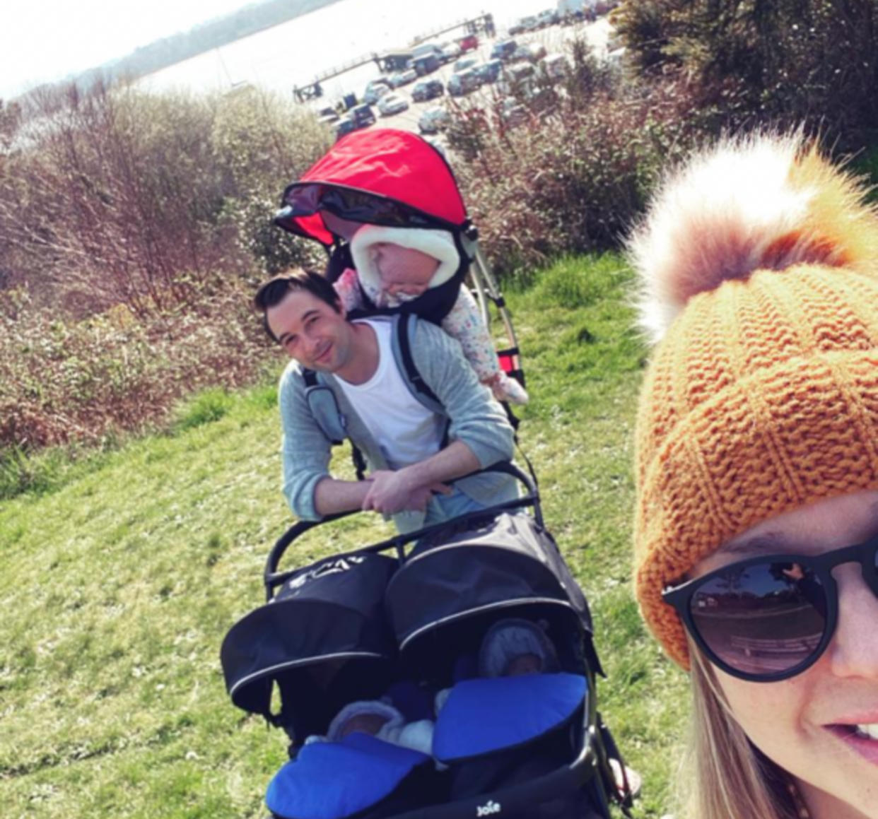 Three under two: the family out on a walk. (Caters)