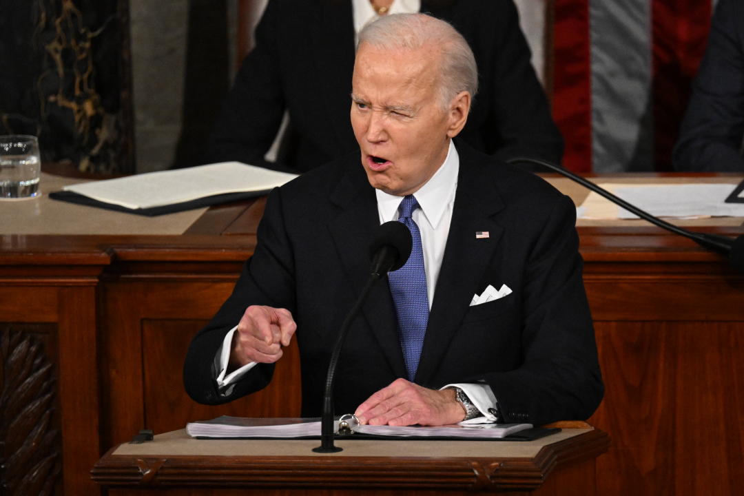 President Biden points during his State of the Union address on Thursday night