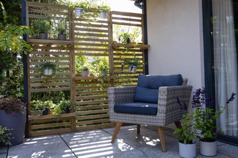 Wall planters at the side of a balcony