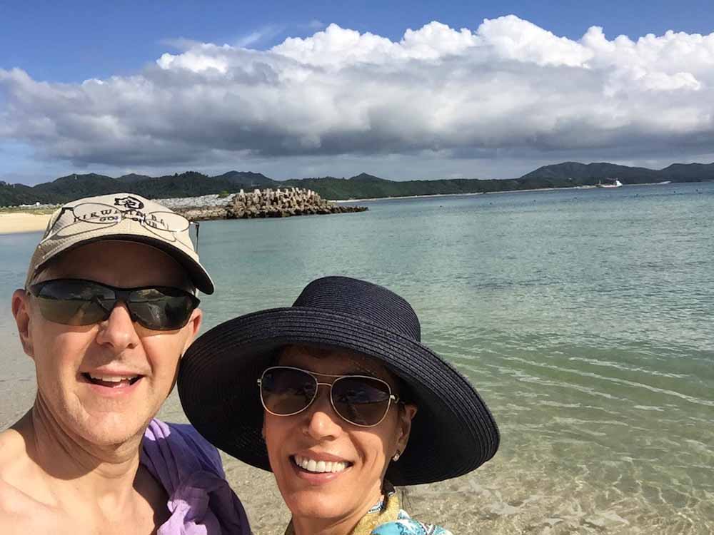 Chris and Galina at the beach in Okinawa. (PA Real Life)