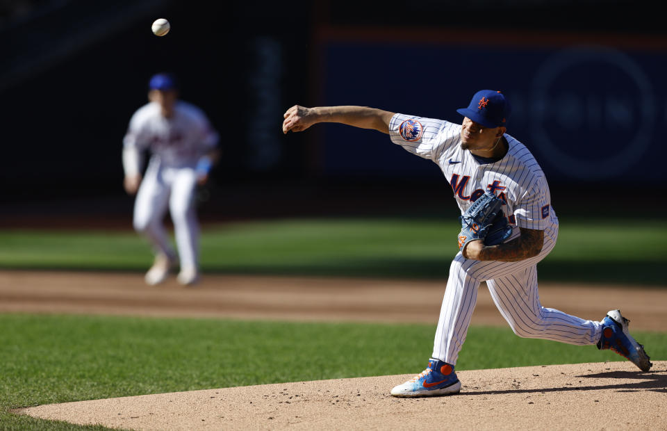 New York Mets starting pitcher Jose Butto throws against the Philadelphia Phillies during the first inning of baseball game Sunday, Oct. 1, 2023, in New York. (AP Photo/Noah K. Murray)