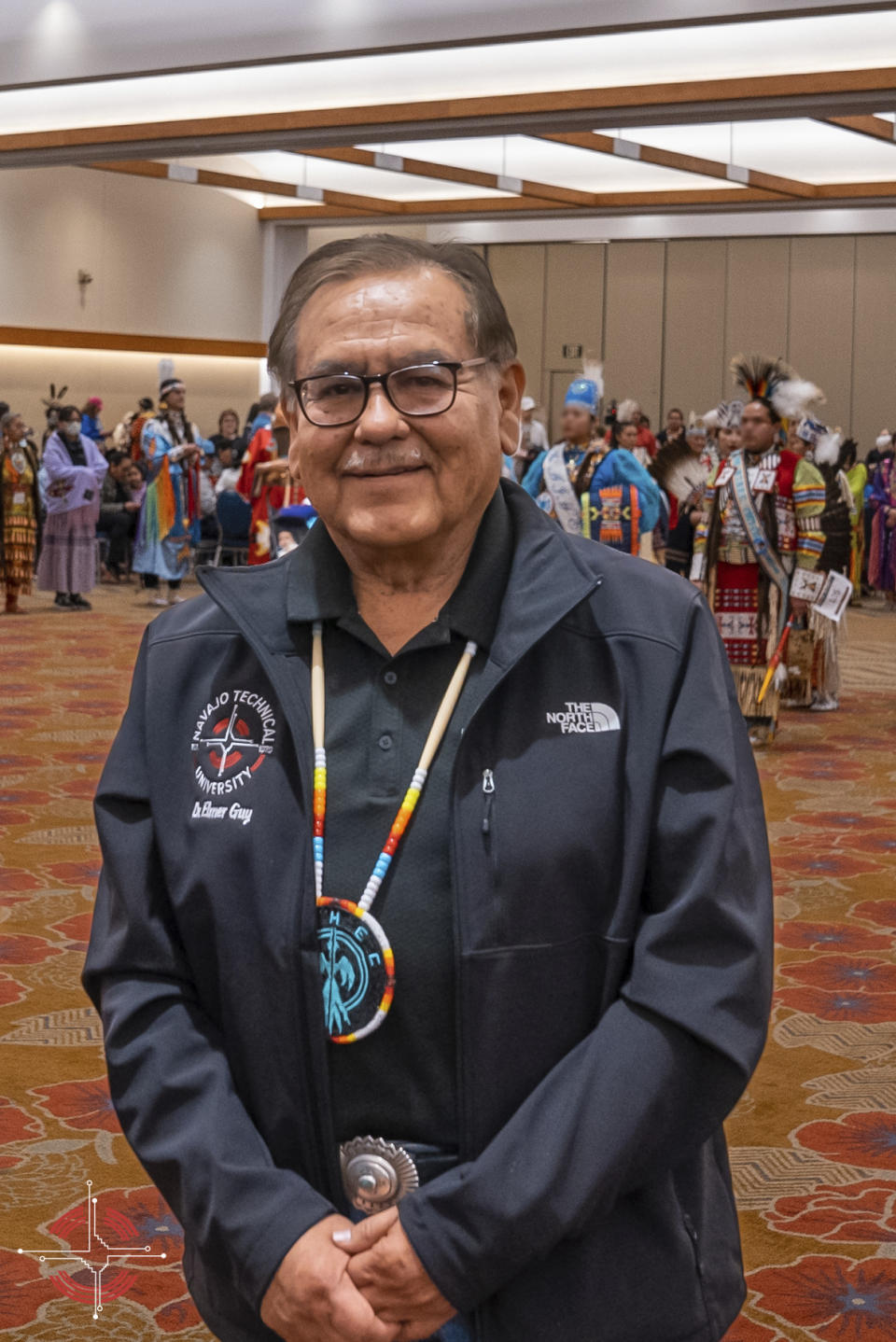 In this photo provided by Navajo Technical University, university President Elmer Guy poses during a higher education conference in Albuquerque, N.M., March 8, 2023. On Friday, March 24, 2023, school officials said the creation of a doctoral program focused on Dine culture and language marks a milestone for the university and is the first doctoral program among tribal colleges and universities in the United States. (Wafa Hozien/Navajo Technical University via AP)