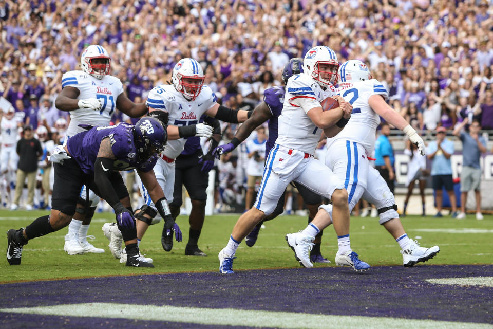 FORT WORTH, TX - SEPTEMBER 21: Southern Methodist Mustangs quarterback Shane Buechele (7) runs into the end zone for a touchdown during the game between SMU and TCU on September 21, 2019 at Amon G. Carter Stadium in Fort Worth, TX. (Photo by George Walker/Icon Sportswire via Getty Images)