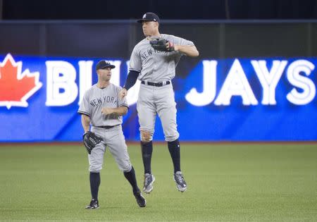 Baseball: Yankees new Murderers' Row hammer Blue Jays in opener