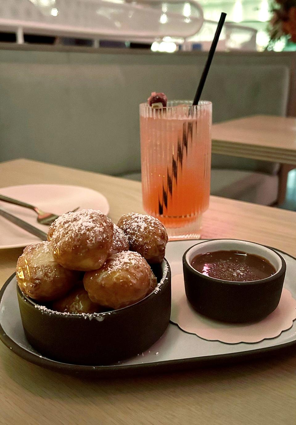 A bowl of sourdough zeppoli at Mad Nice in Midtown Detroit is served with Jivara chocolate sauce.