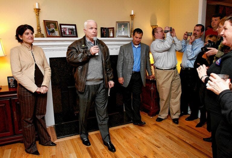 Presidential hopeful Sen. John McCain campaigns at a house party in Bow in 2007.
