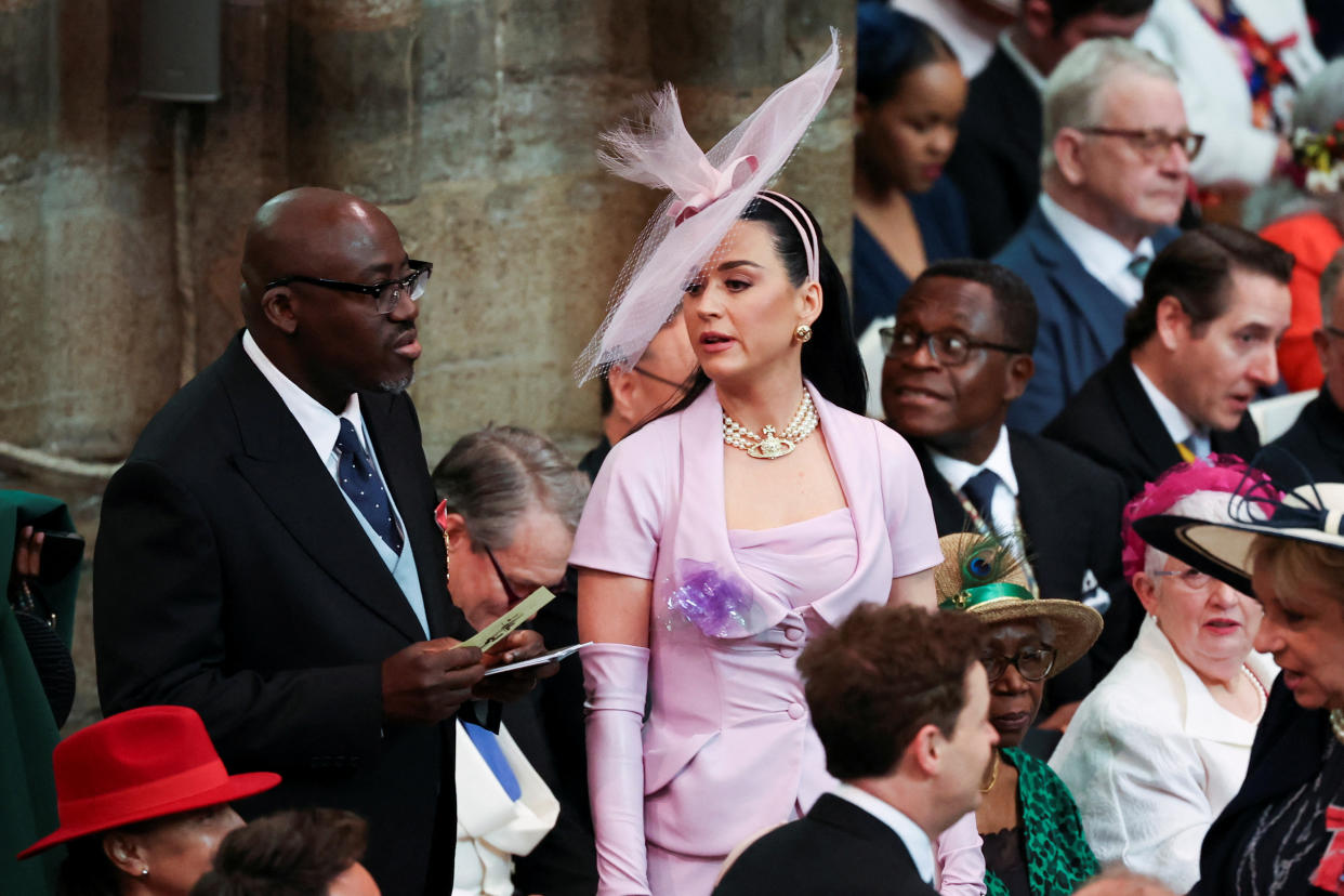 Katy Perry and Vogue editor Edward Enninful appear at the coronation. (Photo: Phil Noble - WPA Pool/Getty Images)