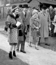 <p>The Queen, dressed in a leopard print coat, attends the Sandown Park race meeting with the Queen Mother. (PA Archive) </p>