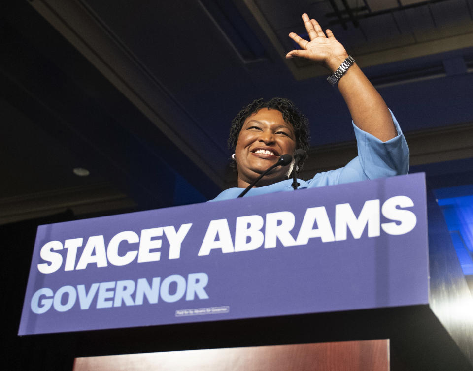 FILE - In this Nov. 6, 2018, file photo, Georgia Democratic gubernatorial candidate Stacey Abrams speaks to supporters about a suspected run-off during an election night watch party in Atlanta. For the vast majority of the nation, the 2018 midterm season is over. Yet the fight rages on in Florida and Georgia, two political battlegrounds where the strength of a Trump-era political realignment among voters by culture and class is being put to the test. Abrams hasn’t conceded her race while Andrew Gillum’s contest in Florida is undergoing a recount. (AP Photo/John Amis, File)