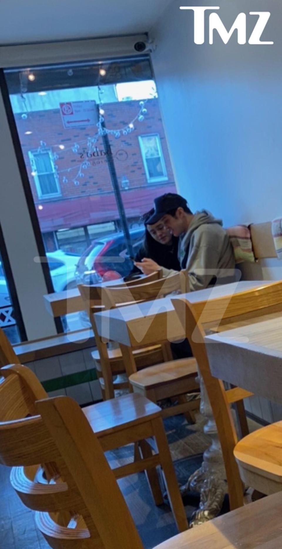 EXCLUSIVE - Pete Davidson and Chase Sui Wonders waiting for takeout Monday afternoon at Baba's Perogies in Brooklyn