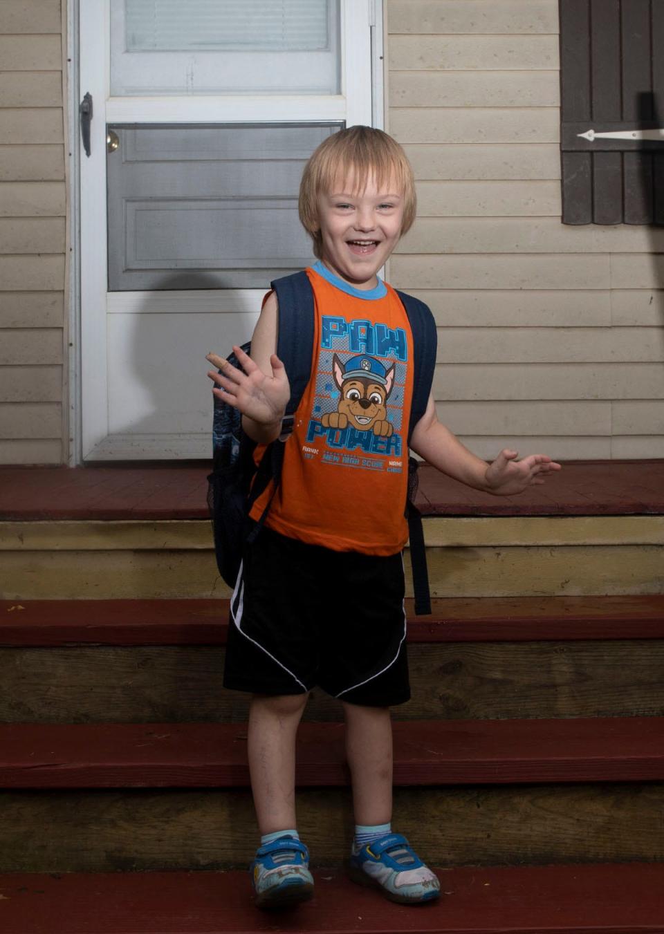Joey Stone, 5, on the porch of his Ravenna home on Friday after school. His mother became concerned when he didn't get home from school until 6:45 p.m. Wednesday.