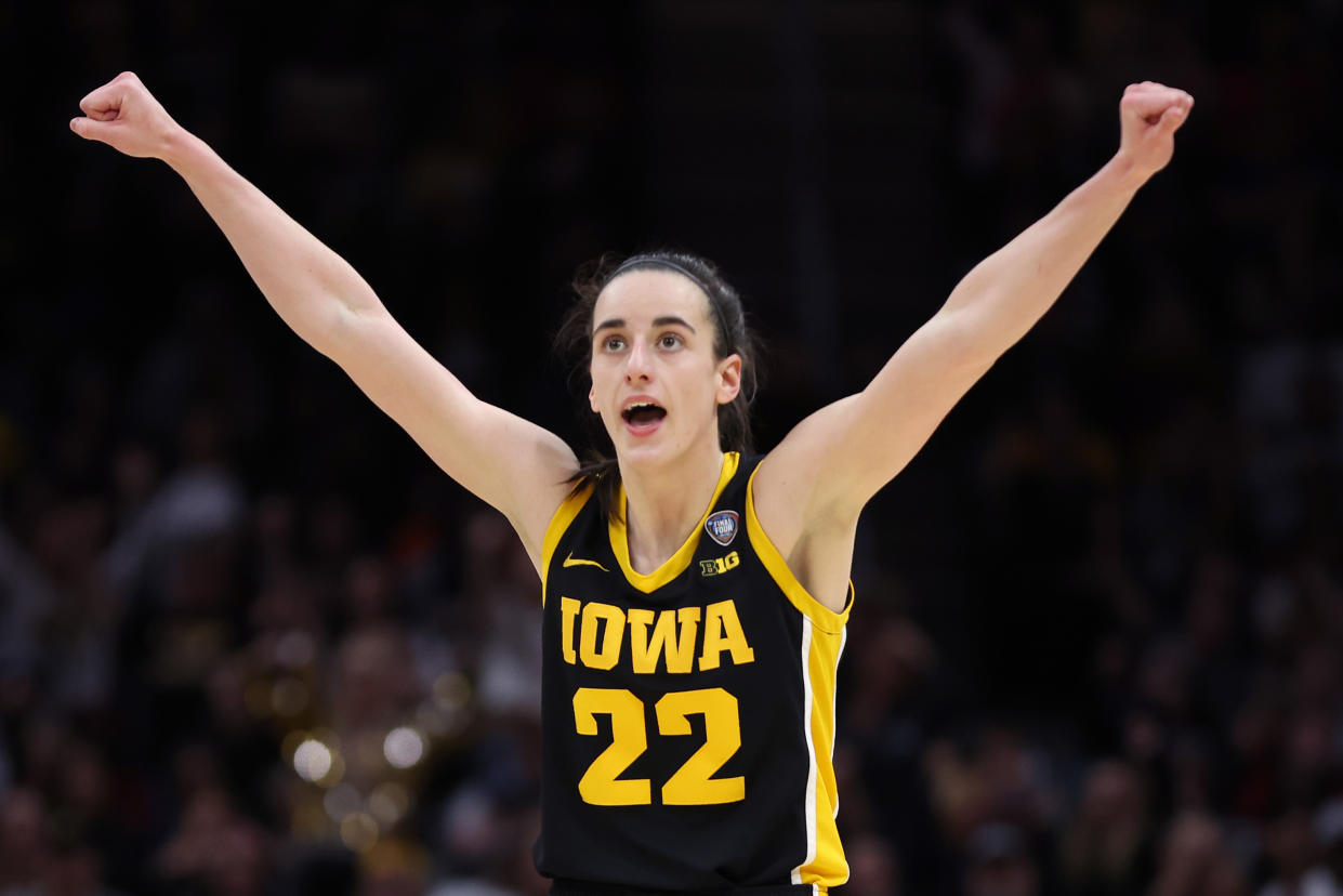 Caitlin Clark will join Megan Gustafson and Michelle Edwards as the only players to have their numbers retired in program history. (Photo by Steph Chambers/Getty Images)