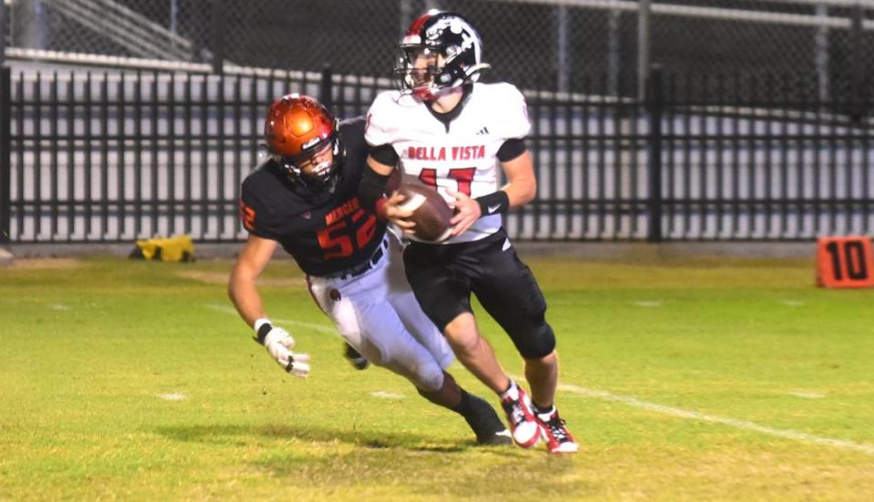 Merced High School senior defensive lineman Jalonn Booth pressures Bella Vista quarterback Riley Dick (17) during the Bears’ 47-0 playoff win on Friday, Nov. 3, 2023 at Cathie Hostetler Stadium in Merced, Calif.