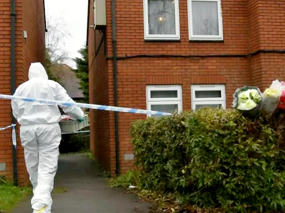 Forensic teams visit the scene of the murder in Arthur Street, Northampton (SWNS)