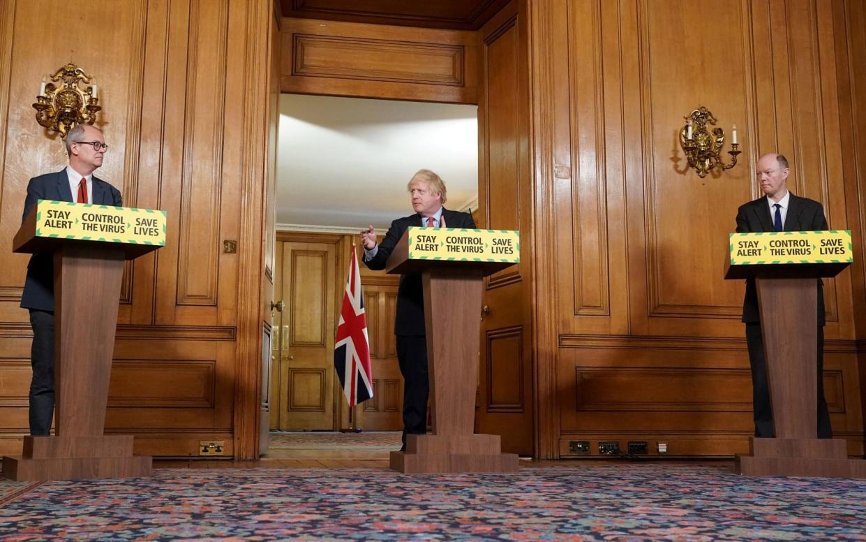 Chief Scientific Adviser Sir Patrick Vallance, Prime Minister Boris Johnson and Chief Medical Officer Professor Chris Whitty during a media briefing in Downing Street - PA