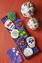 <p>Don't be intimidated by the intricate designs on these cookies — the recipe tells you simple ways to channel your inner artist.</p><p><strong><em><a href="https://www.womansday.com/food-recipes/food-drinks/a23569445/cookie-skulls-and-pumpkin-sugar-cookie-cutouts-recipe/" rel="nofollow noopener" target="_blank" data-ylk="slk:Get the Cookie Skulls recipe.;elm:context_link;itc:0;sec:content-canvas" class="link ">Get the Cookie Skulls recipe. </a></em></strong></p>